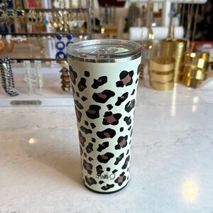 Swig brown/black cheetah print on cream background 20 oz tumbler.